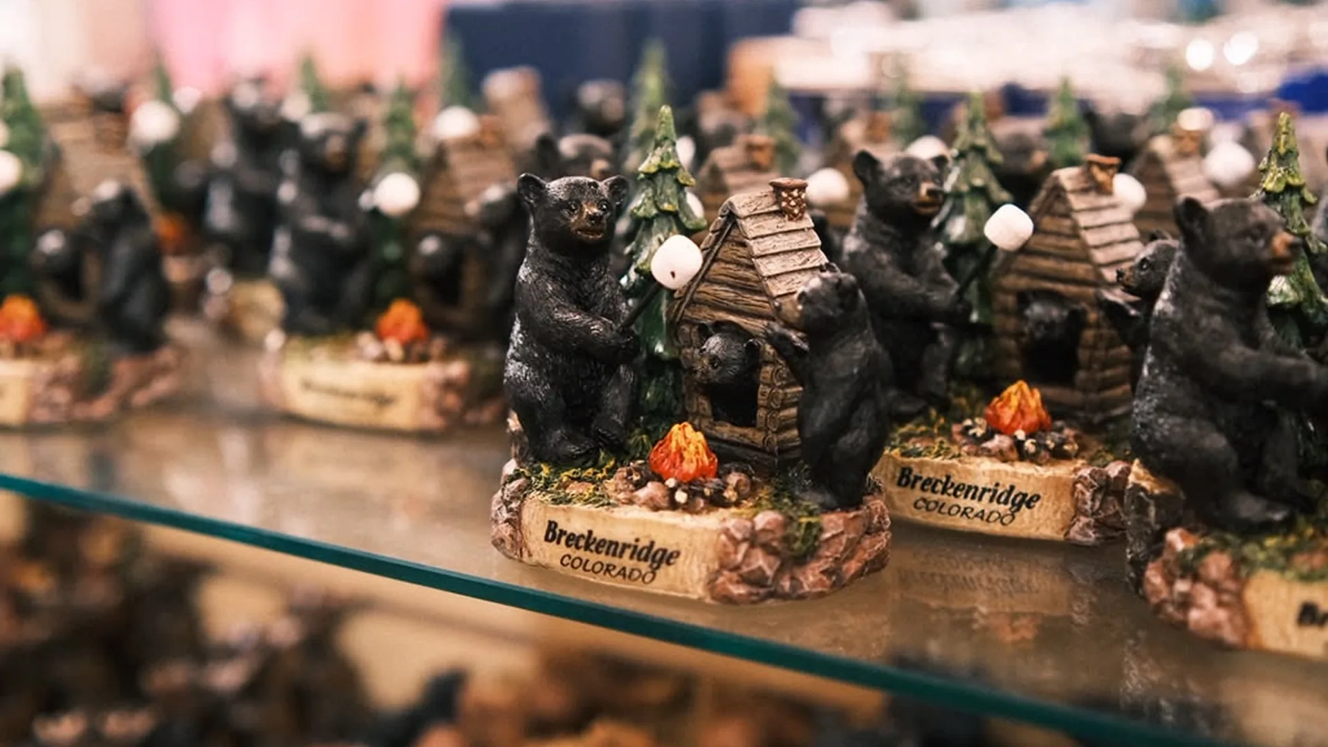 Breckenridge bear figurines and Colorado souvenirs on a gift shop shelf