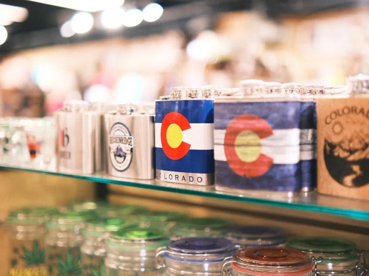 Colorado hip flasks on a gift shop shelf